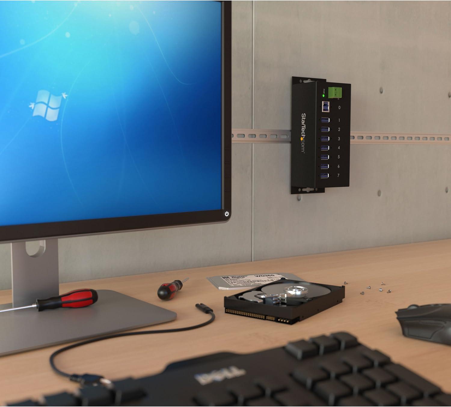 image:imageStarTechcom 7Port USB 30 Hub 5Gbps Metal Industrial USBA Hub with ESD Protection amp 350W Surge Protection Din Rail Wall or Desk Mountable TAA Compliant USB Expander Hub ST7300USBME